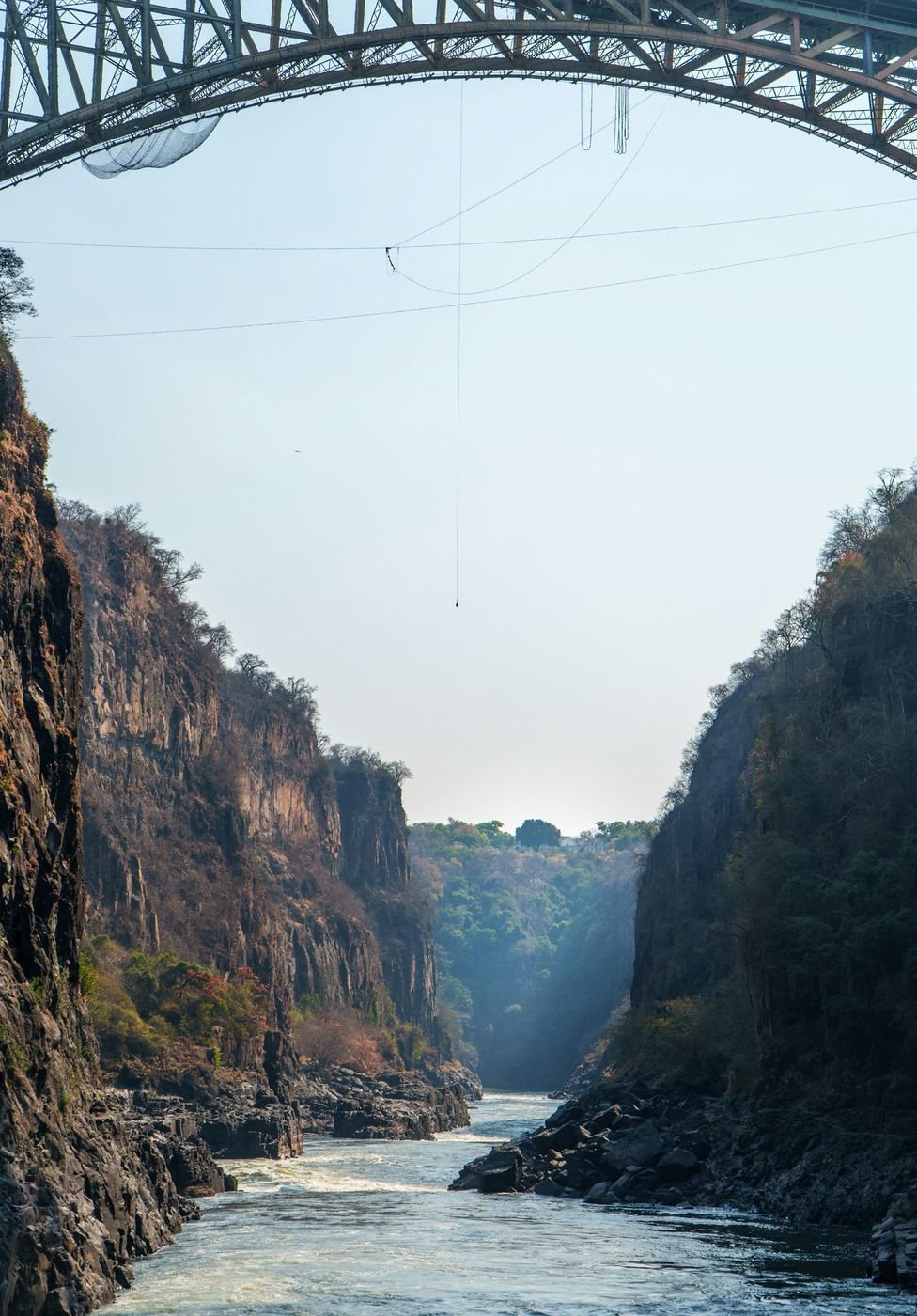 Victoria Falls Bridge above the Batoka Gorge, with a bungee cord hanging from it
